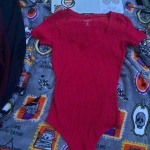 red bodysuit